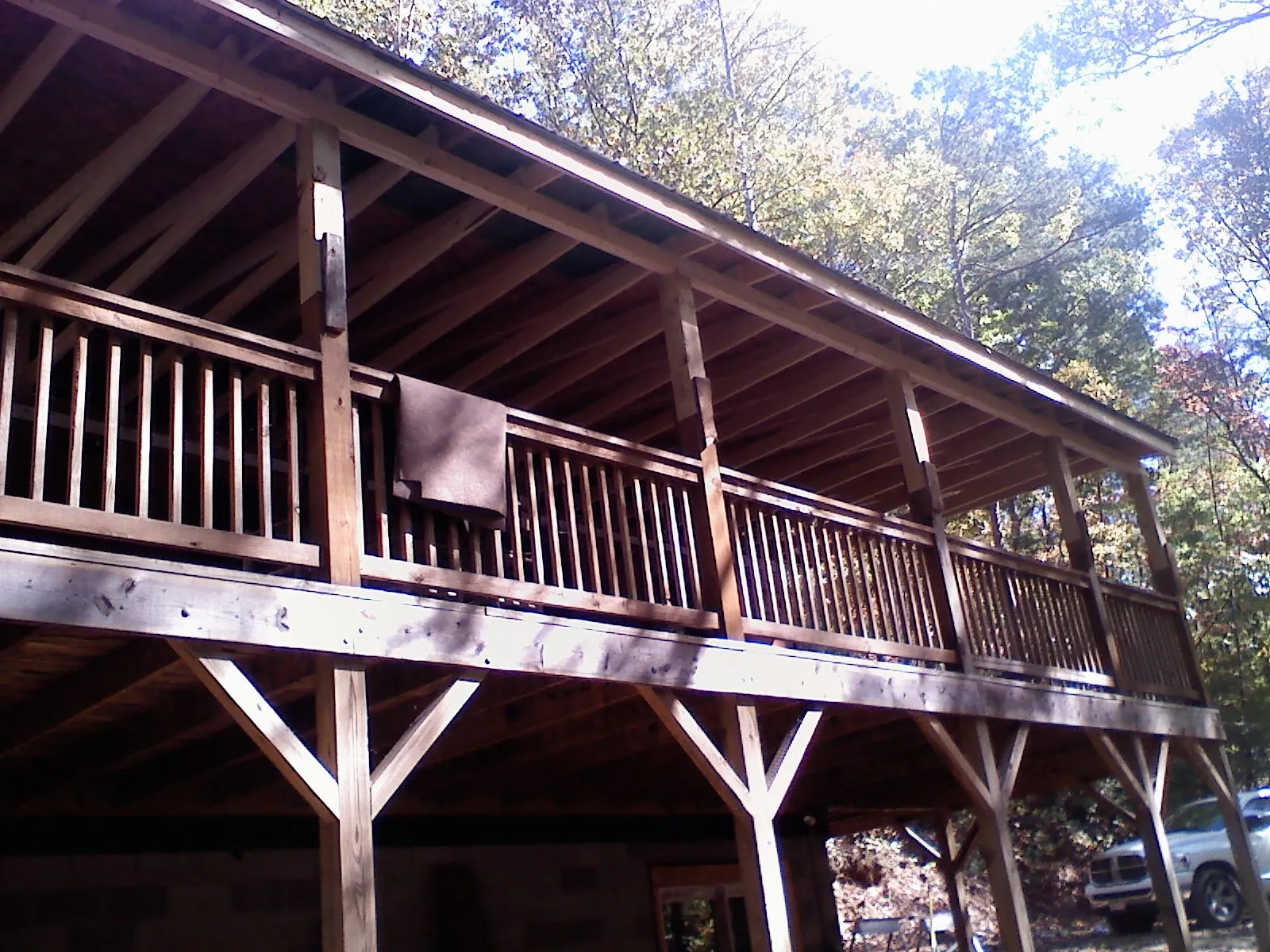 Timber framing under a new elevated porch and deck — Roof Leak Repair in Green by Roofing Brothers